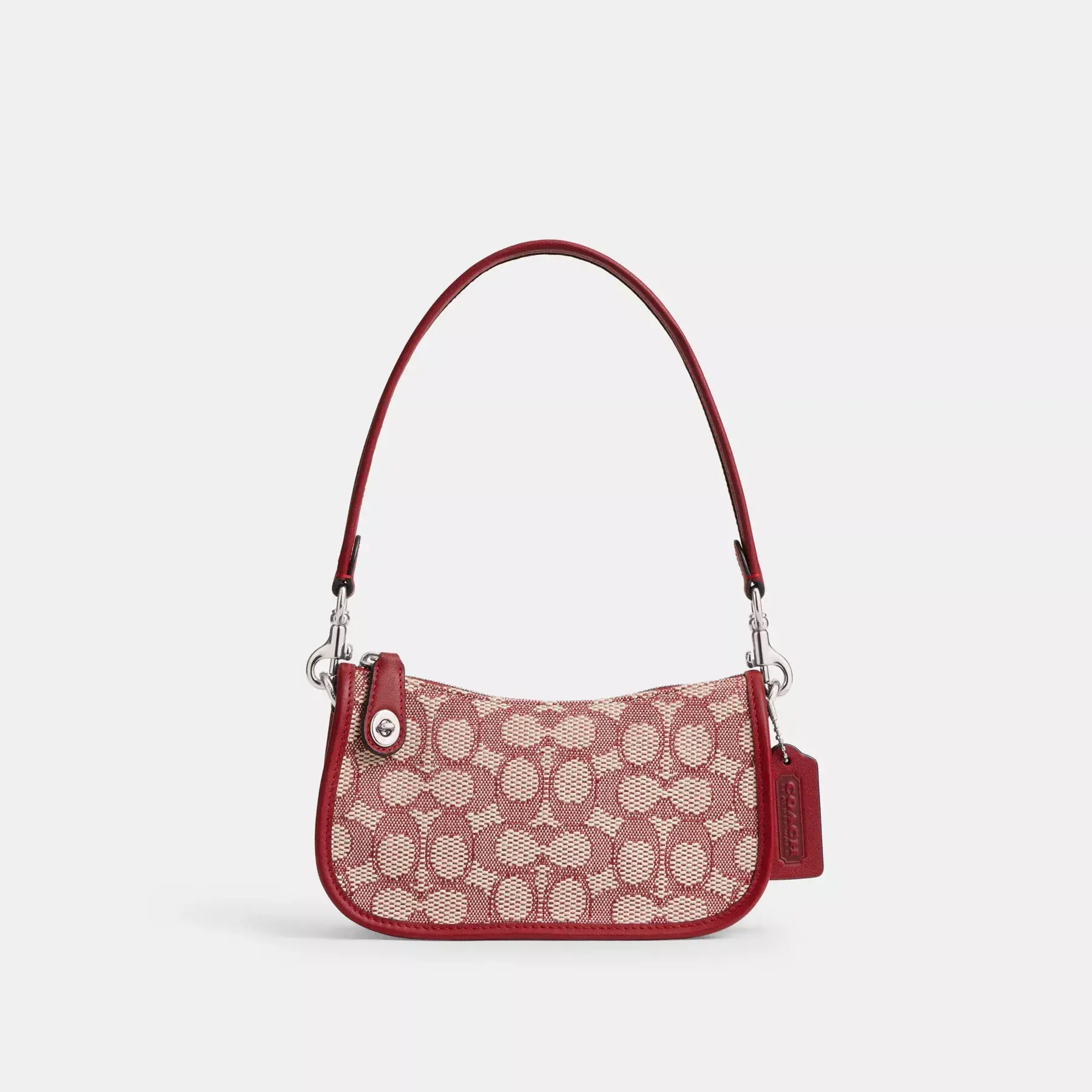 COACH Swinger 20 aus charakteristischem Jacquard Rubin Elfenbein