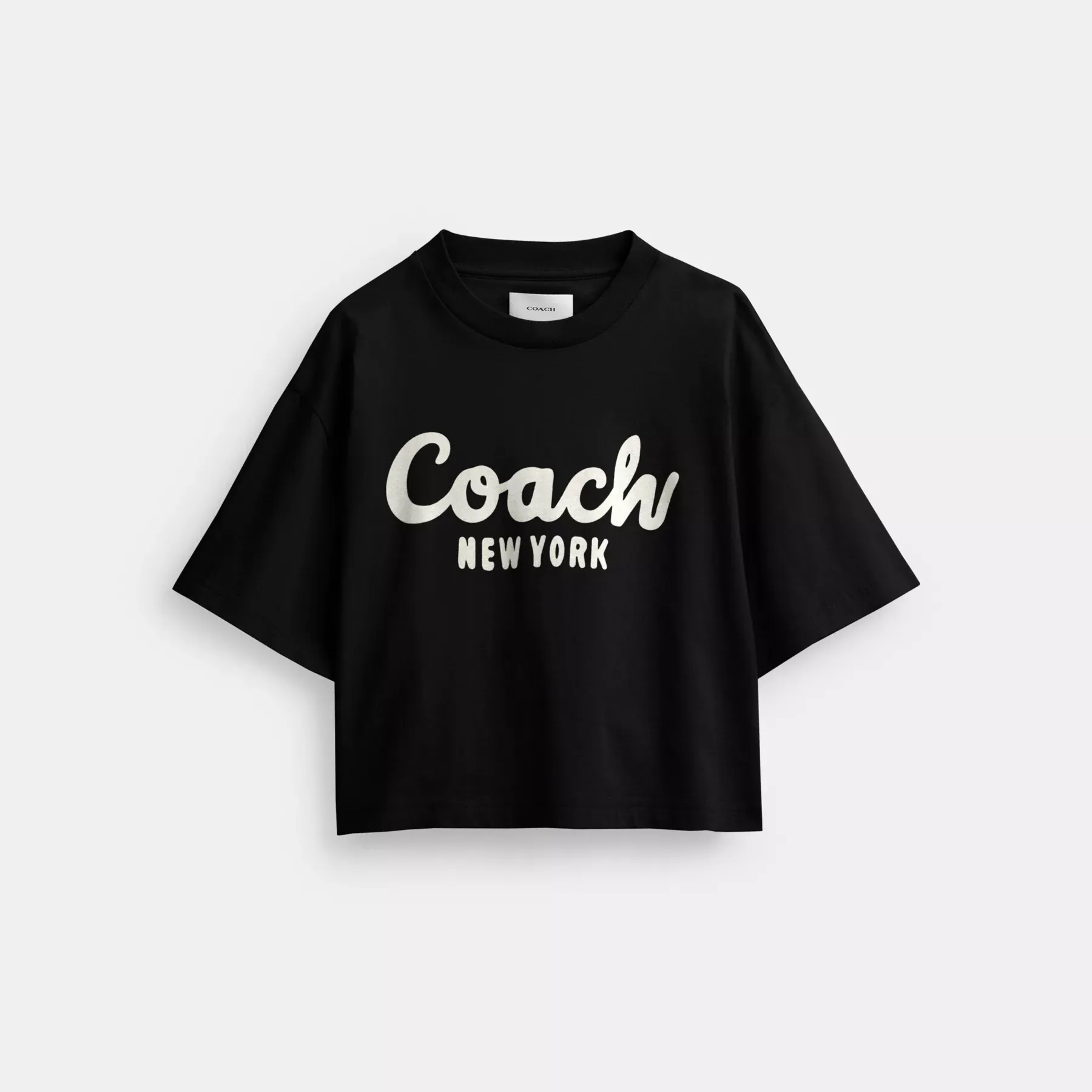COACH Kurzes T-Shirt mit kursivem Signature-Print Schwarz