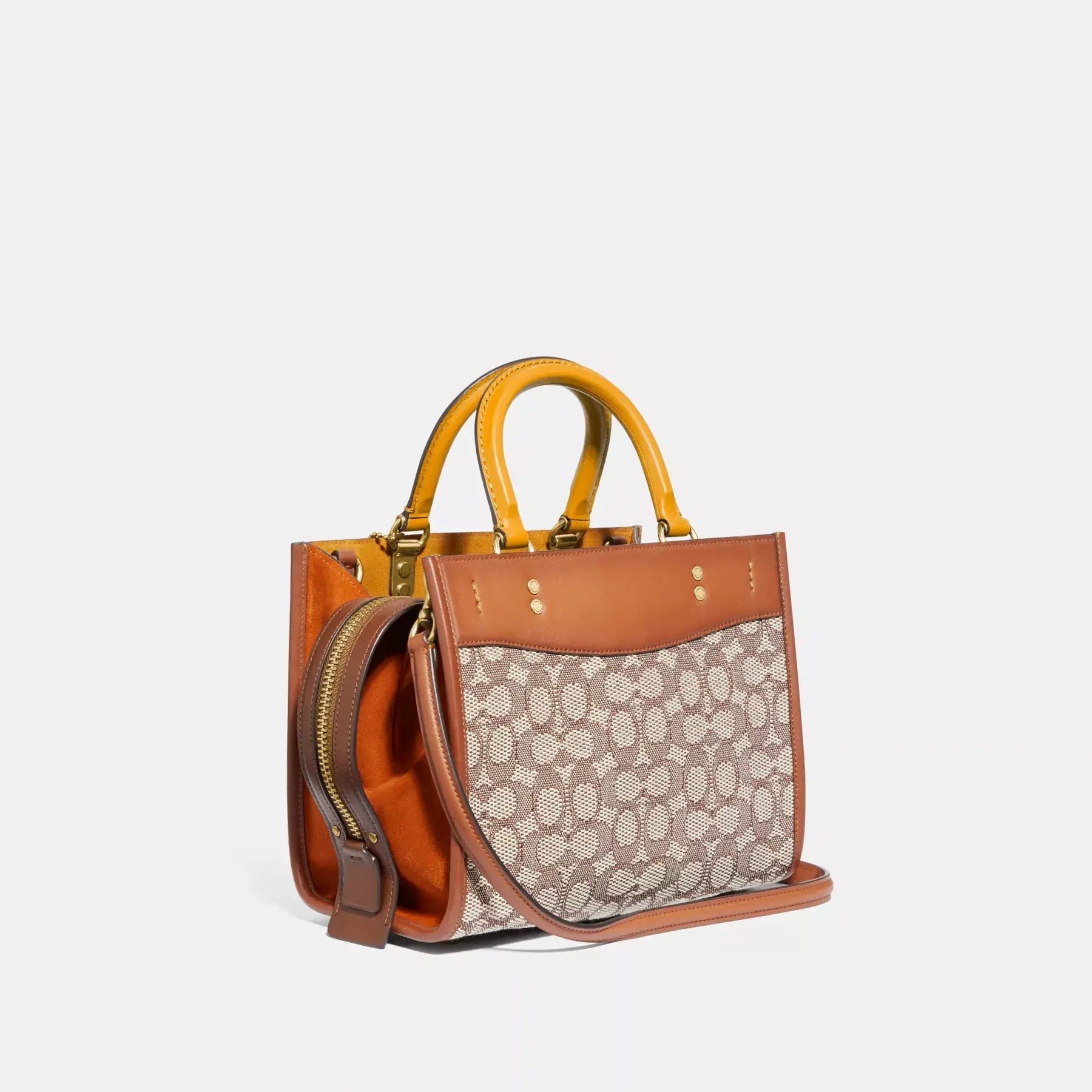 COACH Rogue 25 aus charakteristischem Textil-Jacquard Kakaopolierter Amb