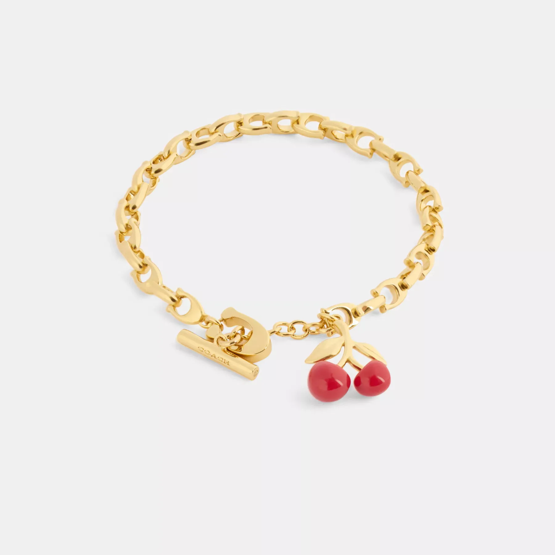 COACH Signatur-Kettenarmband mit Kirschenmotiv aus Harz Gold/Rot