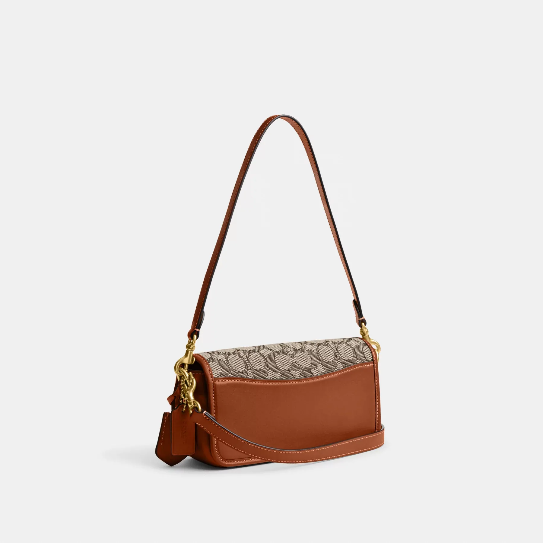 COACH Studio Baguette-Tasche aus charakteristischem Textil-Jacquard Kakaopolierter Amb