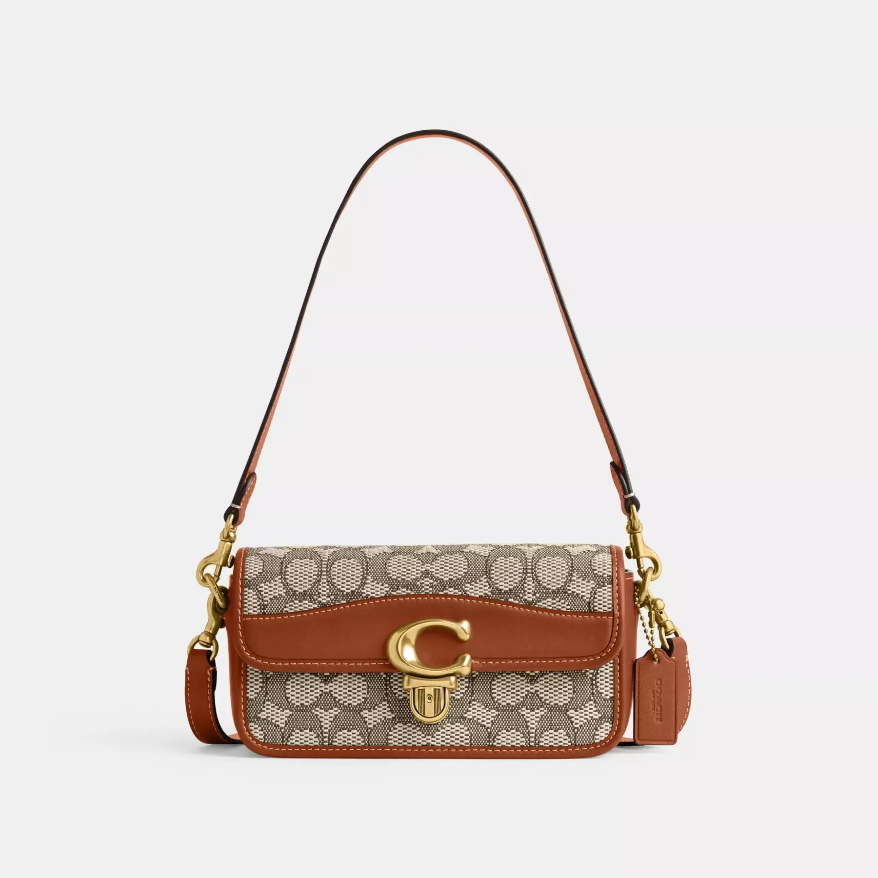 COACH Studio Baguette-Tasche aus charakteristischem Textil-Jacquard Kakaopolierter Amb